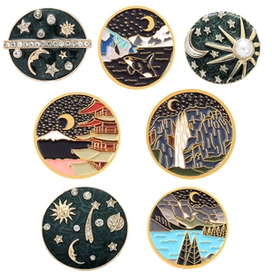 Enamel night scene brooch set featuring stars, moon, mountains and landscape designs