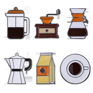 Set of 6 coffee themed enamel pins including french press and moka pot on white background