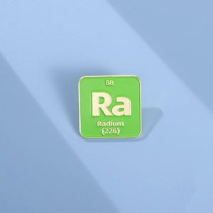 Green Radium chemical element Ra enamel pin with gold finish for geeky science fashion