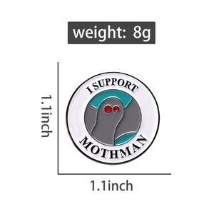 Detail of a 1.1-inch round enamel Mothman badge pin with I Support Mothman text