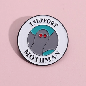 Creative enamel Mothman pin with red eyes on a pink background for apparel decoration