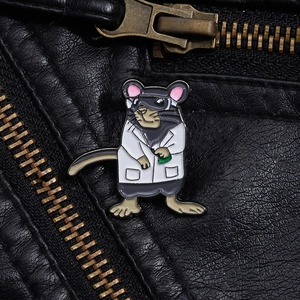 Detail of cartoon lab mouse enamel pin with green flask pinned on black leather jacket