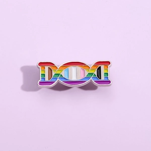 Rainbow DNA double helix metal brooch pin with vibrant enamel finish on purple background