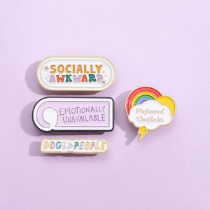 Set of 4 cute rainbow-themed enamel pins featuring pastel colors on a light purple background