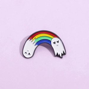 Close-up of rainbow enamel ghost brooch with heart-shaped eyes and colorful lacquer finish