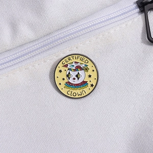 Creative geometric round clown enamel pin badge with Certified Clown text on white canvas