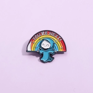 Spilla smaltata cartone animato mietitore su arcobaleno con testo 'YOU'RE NEXT!'
