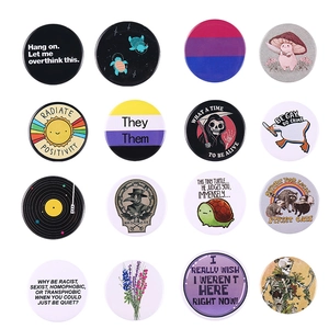 Set of 16 creative animal and alphabet tinplate badges with minimalist round brooch design