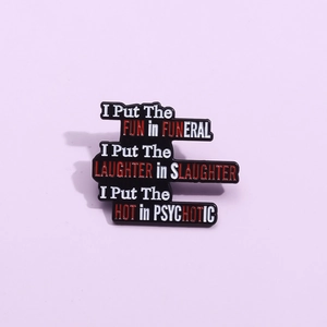 Detailed view of a black enamel pin with funny English text on a purple background