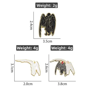 Detailed view of Good Omens style enamel pins with size and weight measurements