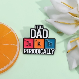 Macro detail of enamel lapel pin with chemical periodic table style humor for Father Day