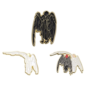 Good Omens angel wings enamel pin set in black white and gold metallic finish