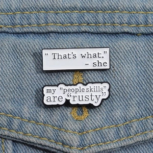 Funny geometric speech bubble enamel pins with inspirational quotes on denim fabric