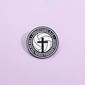 Religious volleyball enamel pin with black cross and I Can Do All Things Bible verse