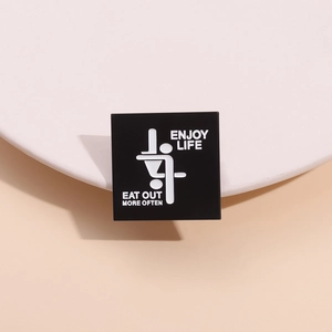 Funny square metal badge with 'ENJOY LIFE EAT OUT MORE OFTEN' slogan for adults