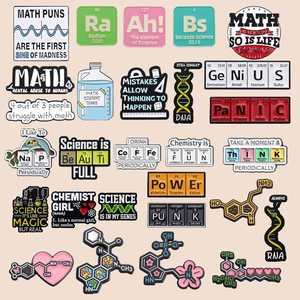 Set of colorful science enamel pins featuring math formulas and chemical molecular structures