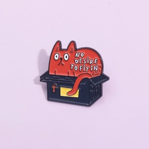 Cute cartoon red cat in a box enamel pin brooch with No Desire to Fit In slogan