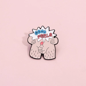 Funny cartoon legs enamel pin with 'GOOD FEELS' text on a pink background
