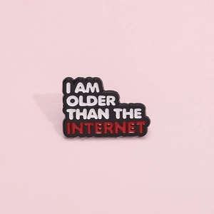 Minimalist enamel badge pin featuring I Am Older Than The Internet quote in black and red