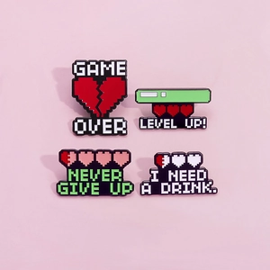 Set of 4 pixel art enamel pins with gaming slogans on a soft purple background