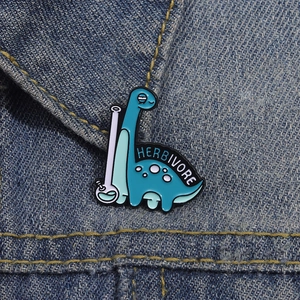 Cute cartoon herbivore dinosaur enamel pin on denim background with purple bong detail