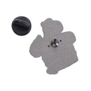 Detail view of the silver enamel pin back with a durable black rubber clutch closure