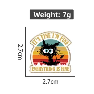 Détail du badge chat avec spécifications de taille 2,7cm et poids de 7g