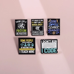 Close-up of five science enamel pins featuring microscopes and biology slogans on pink base