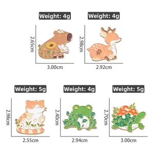 Set of five cute cartoon enamel pins showing animal designs with sizes and weights