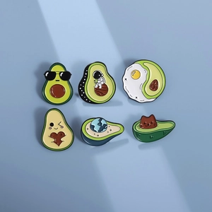 Detailed set of six creative enamel avocado badges with cute cat and astronaut designs