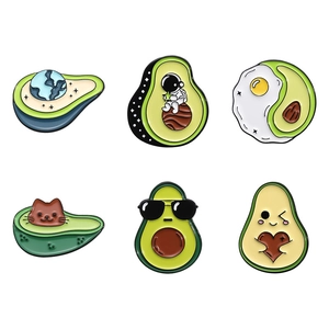 Set of 6 creative avocado enamel pins with astronaut, cat and heart designs on white background