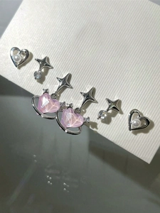 Detailed set of six silver and pink heart stud earrings with pearls and star motifs