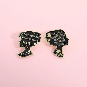 Literary enamel pins with Pride and Prejudice quotes on a pink background