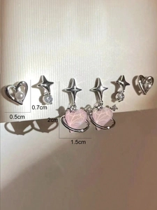 Detailed size chart showing pink heart and star earring set dimensions in centimeters