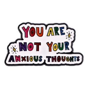 Detail of colorful cloud enamel pin with You Are Not Your Anxious Thoughts slogan
