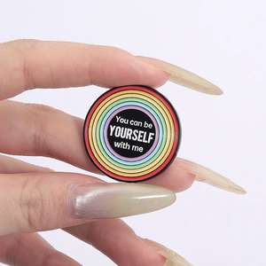 Rainbow enamel pin featuring 'You can be YOURSELF with me' text on a round metal badge