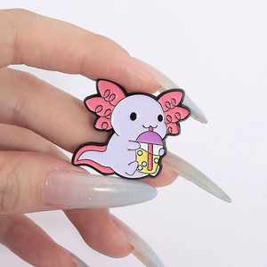 Detailed view of a cute purple axolotl enamel pin holding a cup of yellow bubble tea