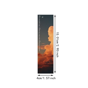 Detail of bookmark featuring a sunset sky with a crescent moon and motivational quote