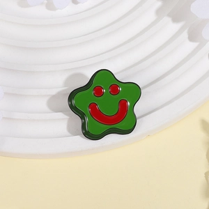 Creative green star enamel brooch with a classic red smiley face design on metal base
