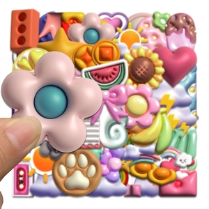 Close-up of 3D resin cartoon charms featuring pink flowers, cat paws and rainbow elements