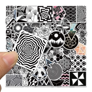 Close-up of waterproof geometric stickers for laptops and luggage with abstract patterns
