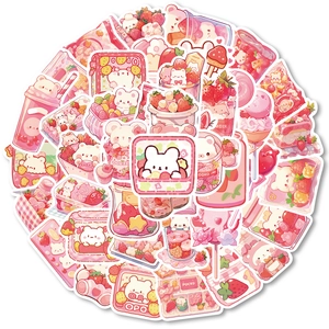 Close-up of cute pink cartoon snack stickers featuring bears and bunnies for scrapbooking