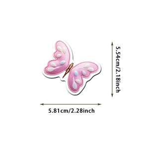 Close-up of pink embroidered butterfly patch with detailed stitching and dimensions