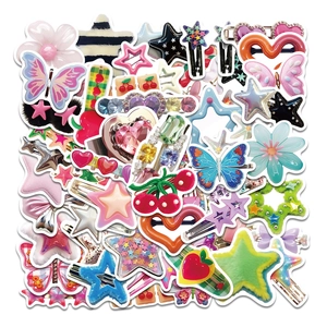 Close-up of colorful Y2K aesthetic hair clips featuring stars, hearts and flowers