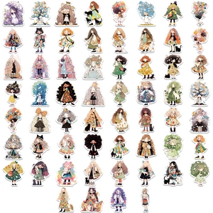 Vue à plat de 60 autocollants uniques de filles de dessin animé aux motifs artistiques
