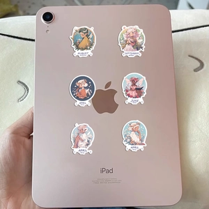 Detail of waterproof PVC flower fairy stickers on tablet back showing cute anime girl designs