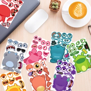 DIY cartoon monster stickers pack on a desk for creative puzzle making and fun crafts