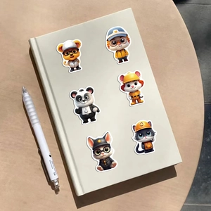 Detailansicht von 3D-Tieraufklebern auf Notizbuch mit glatter PVC-Textur und Glanz