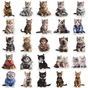 Detail of 25 cute cartoon cat stickers wearing mini outfits for DIY journals and decor