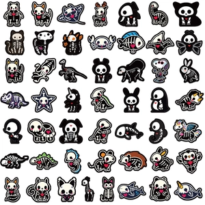 Collection of 49 black and white animal skeleton stickers with red hearts for laptops